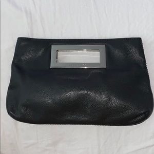 Michael kora clutch